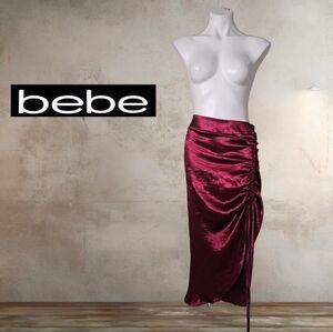 Bebe Asymmetrical Skirt in Deep Burgundy Size 4( As Is With Snag)